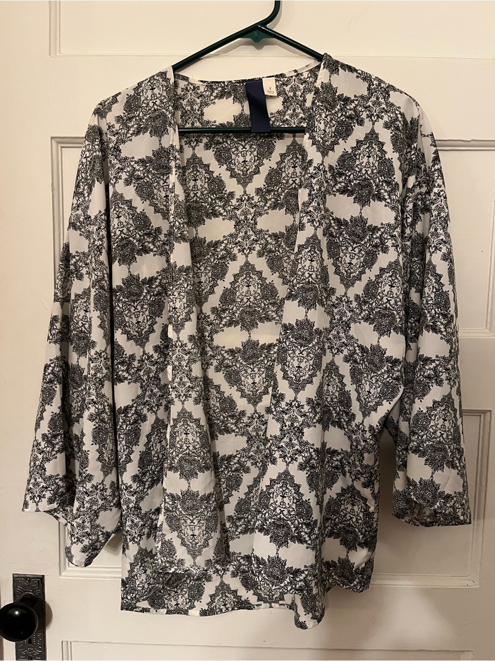Francesca's Collections Black and White Patterned Open Cardigan